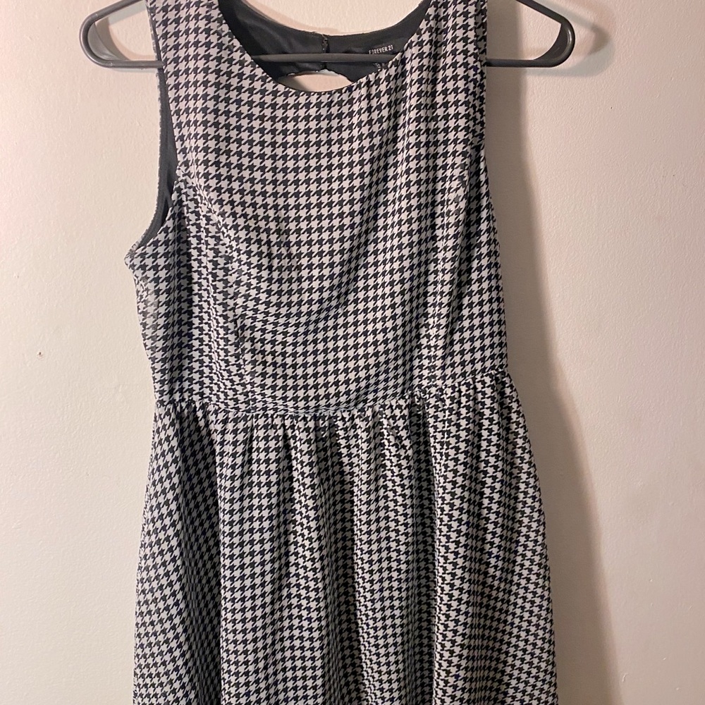Checkered dress with oval cut out in back
